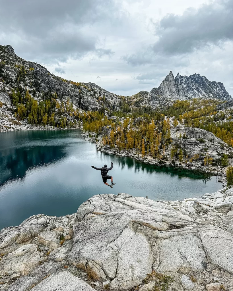 jumping for joy above Inspiration Lake