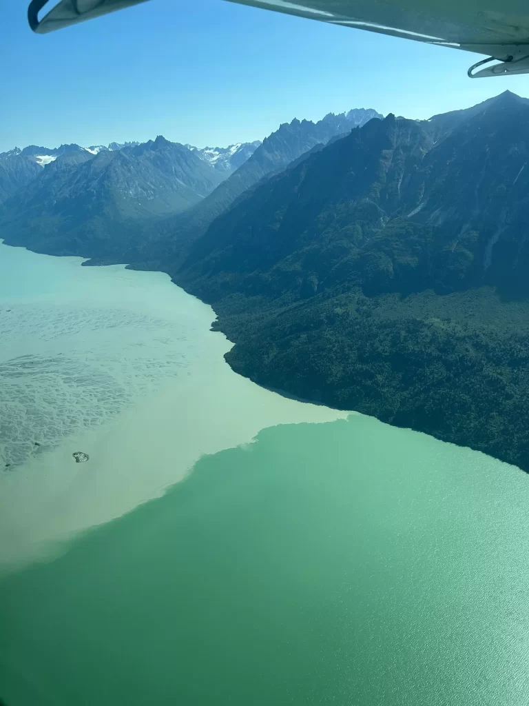 Views of turquoise lake below from a plane