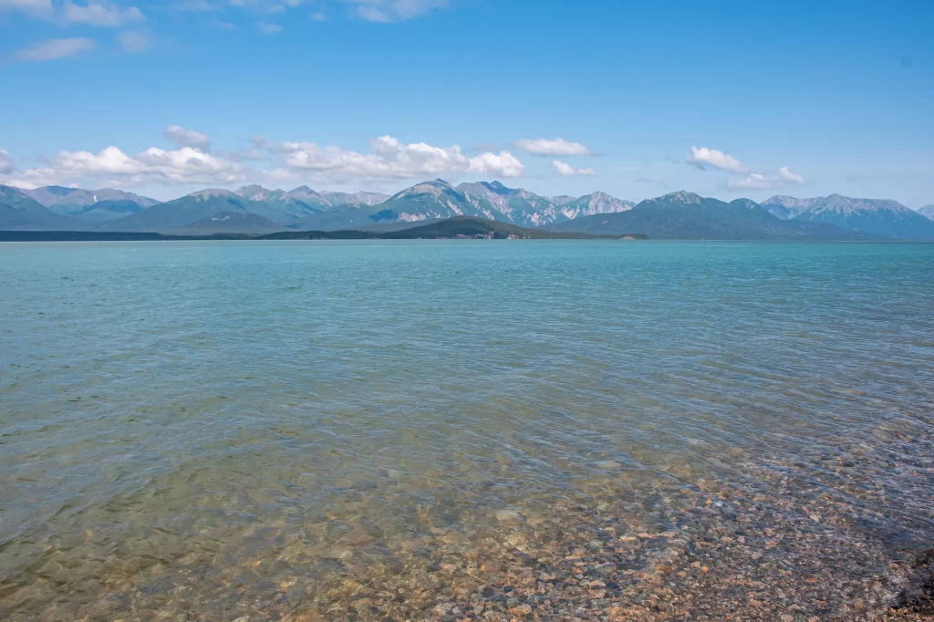 lake clark waters with mountains behind