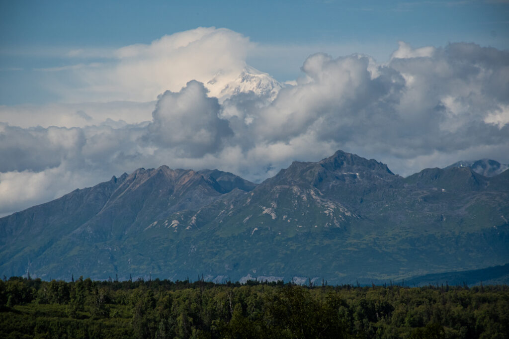 Denali peaking out from the clouds