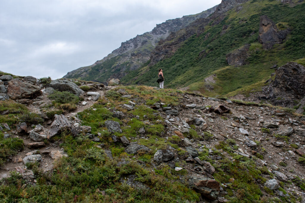 girl standing on a mountain in Denali