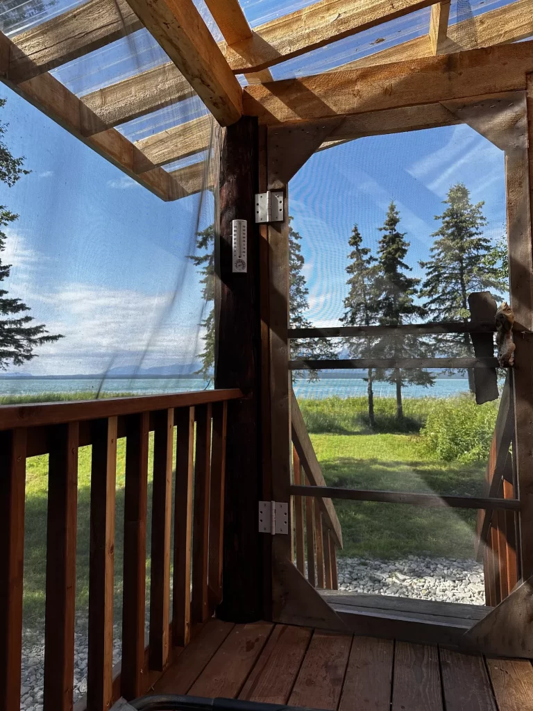 screened in porch view of lake clark