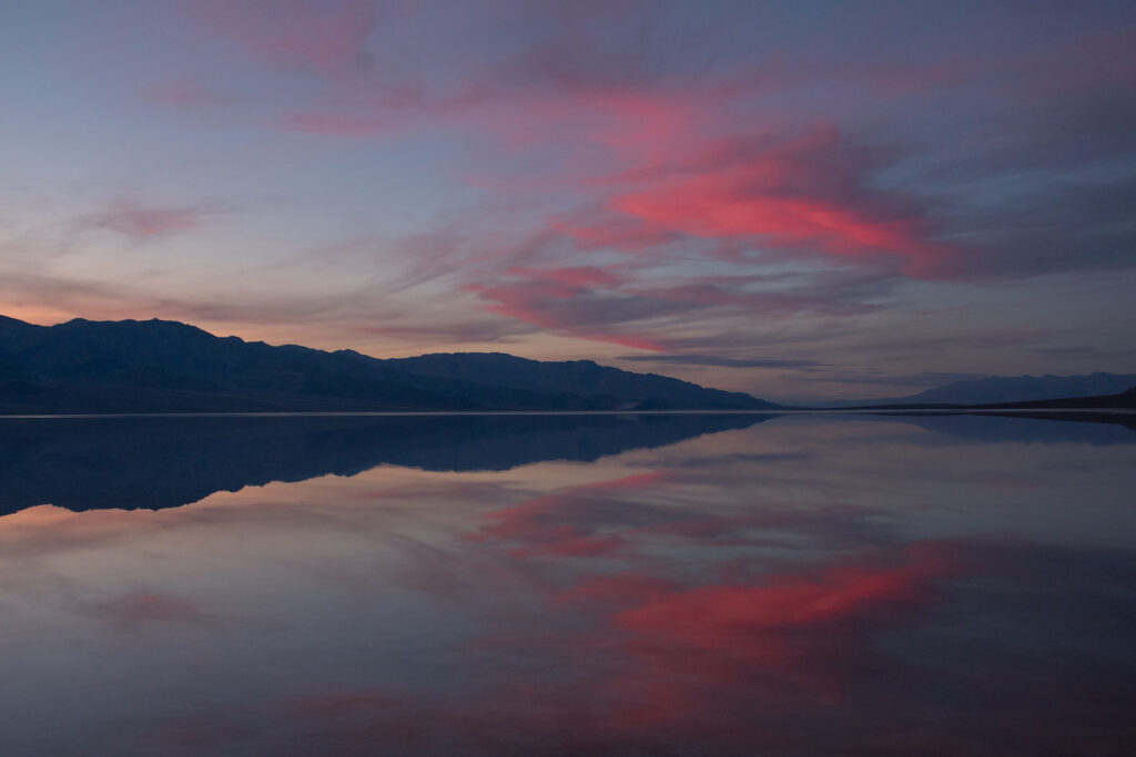 bright sunset pinks over lake manly in death valley