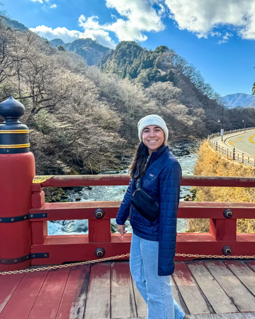 girl standing on a bridge