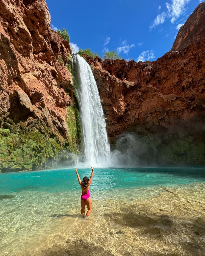 girl standing at Mooney Falls