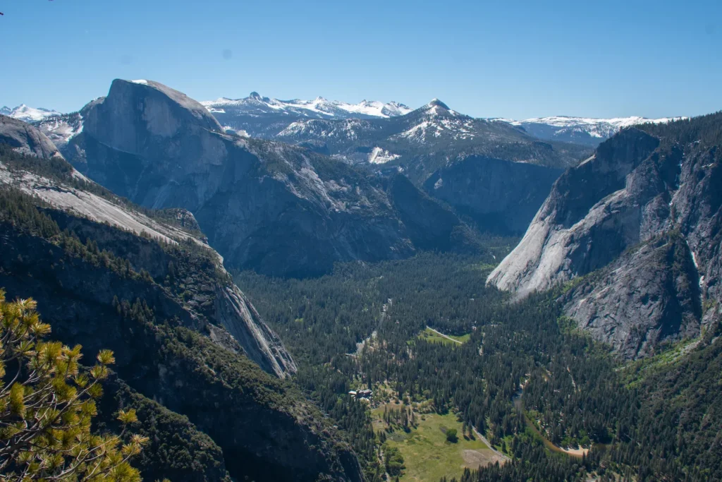 view of half dome and valley from yosemite point