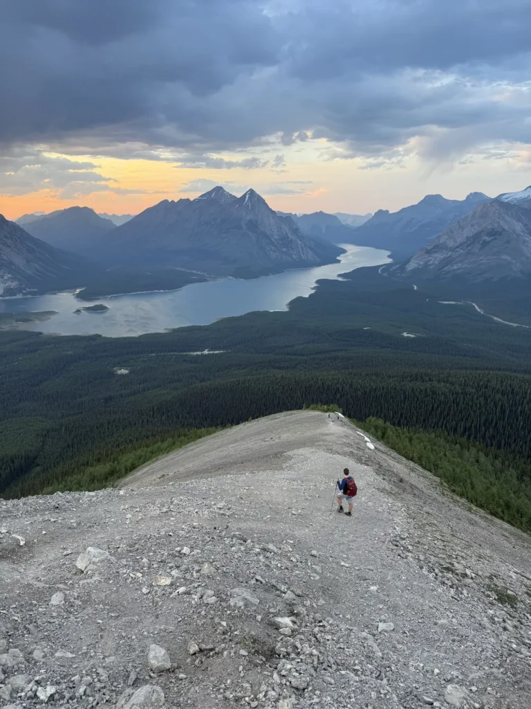 Guy walking down the scree