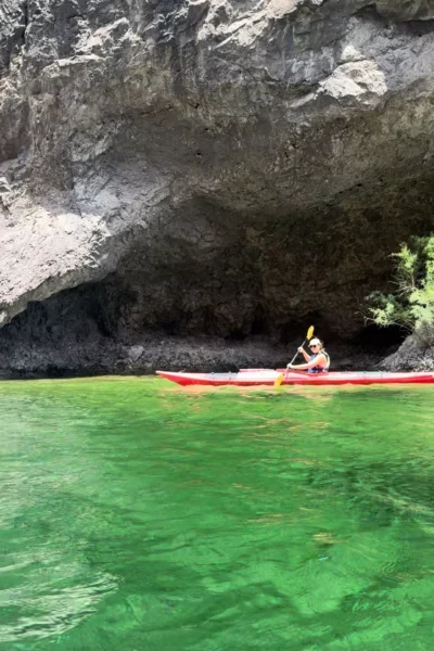 girl kayaking in Emerald Cave