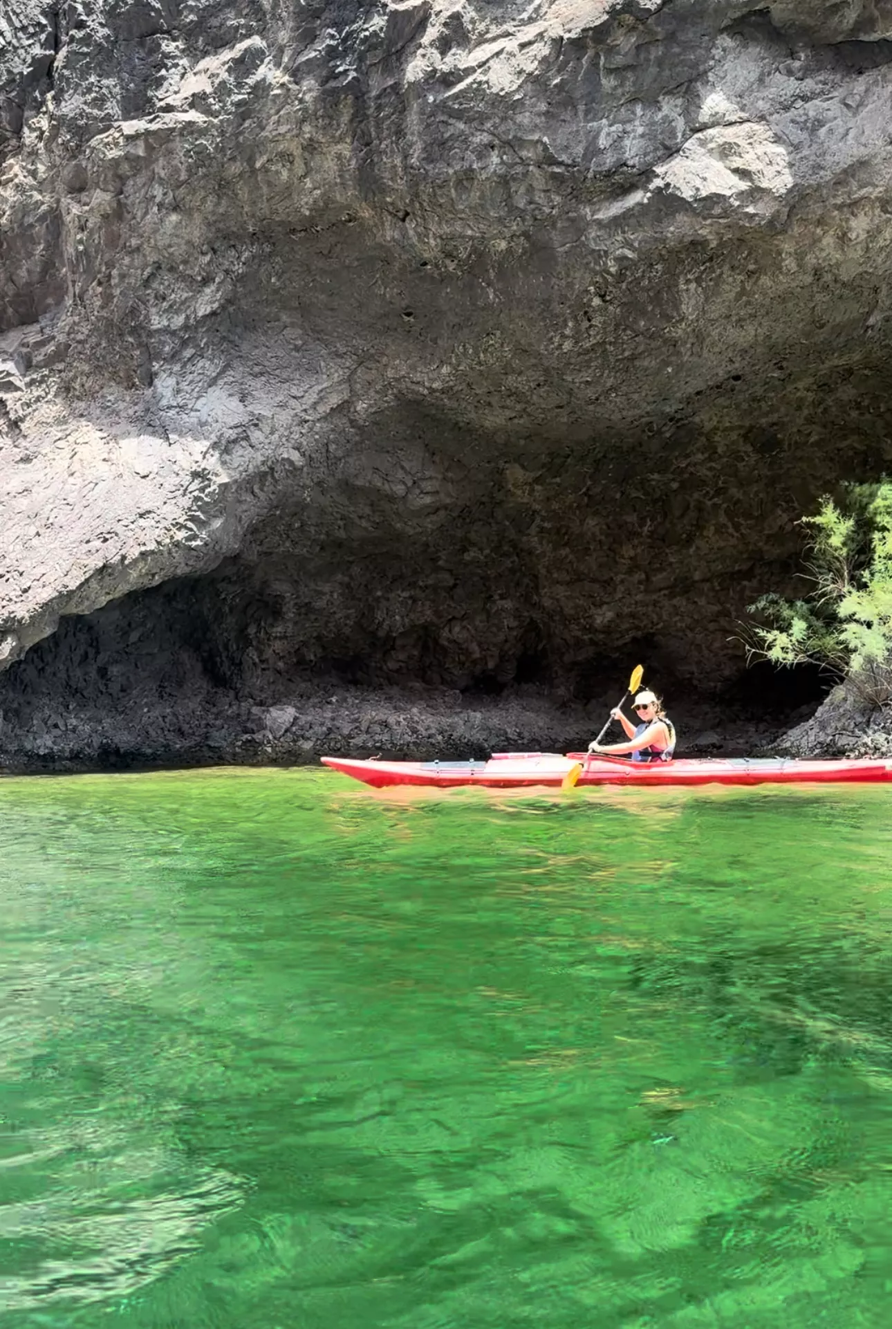 girl kayaking in Emerald Cave