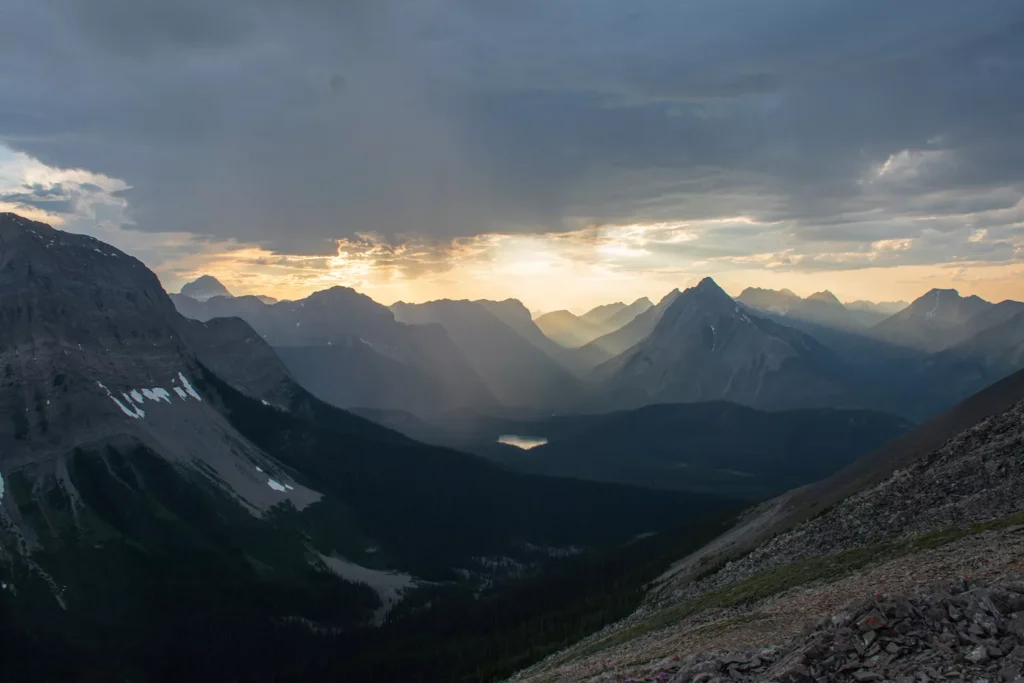 views of mountains with sun coming down