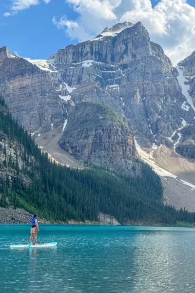 girl paddling on moraine lake