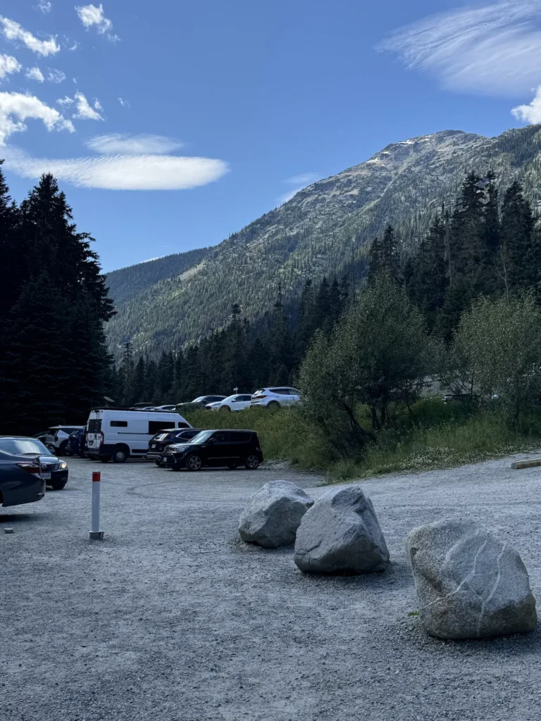 Mountain sitting above a parking lot