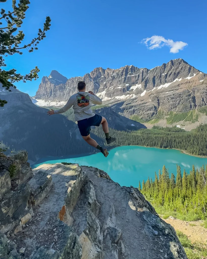 Guy jumping on Alpine Circuit Trail