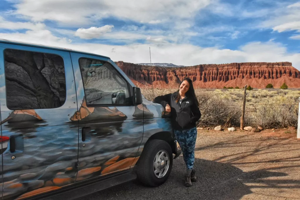 Girl with van outside capitol reef
