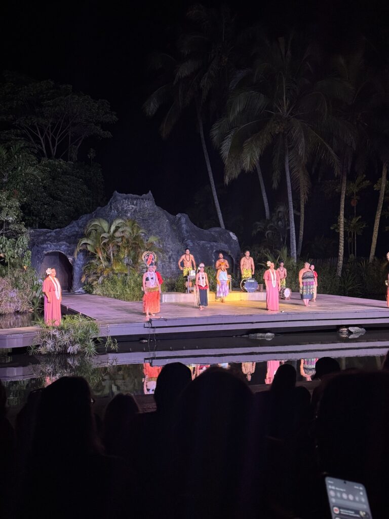 people in all costumes at a luau