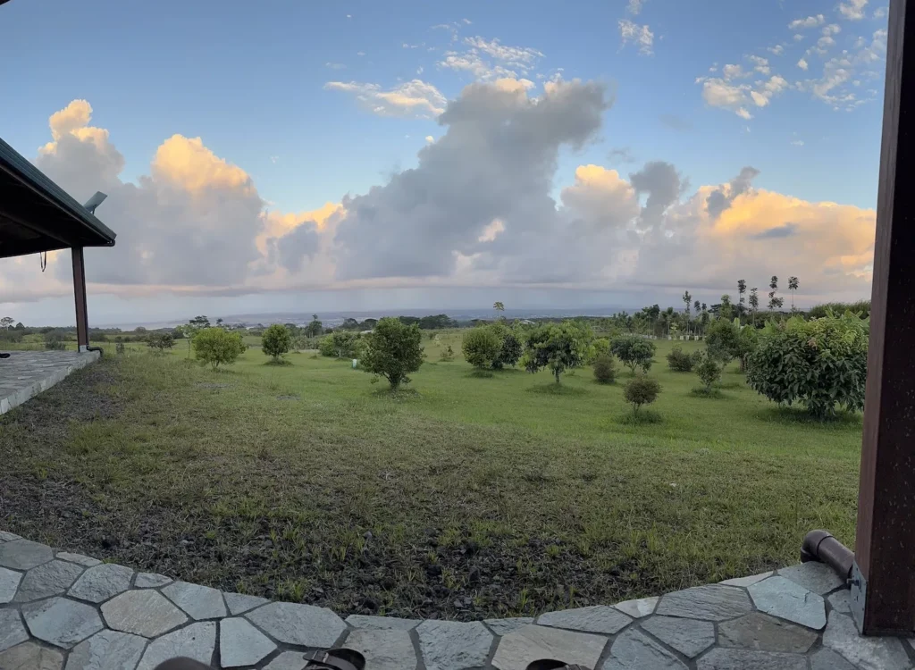 view from an airbnb farm at sunset