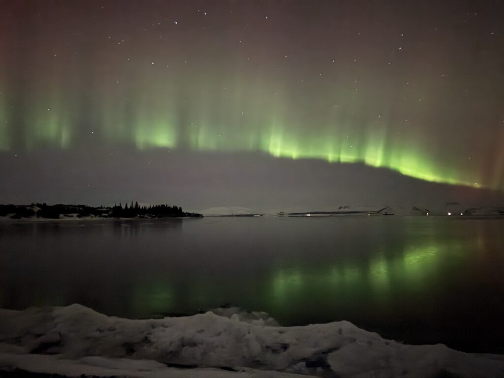 Green reflecting off water