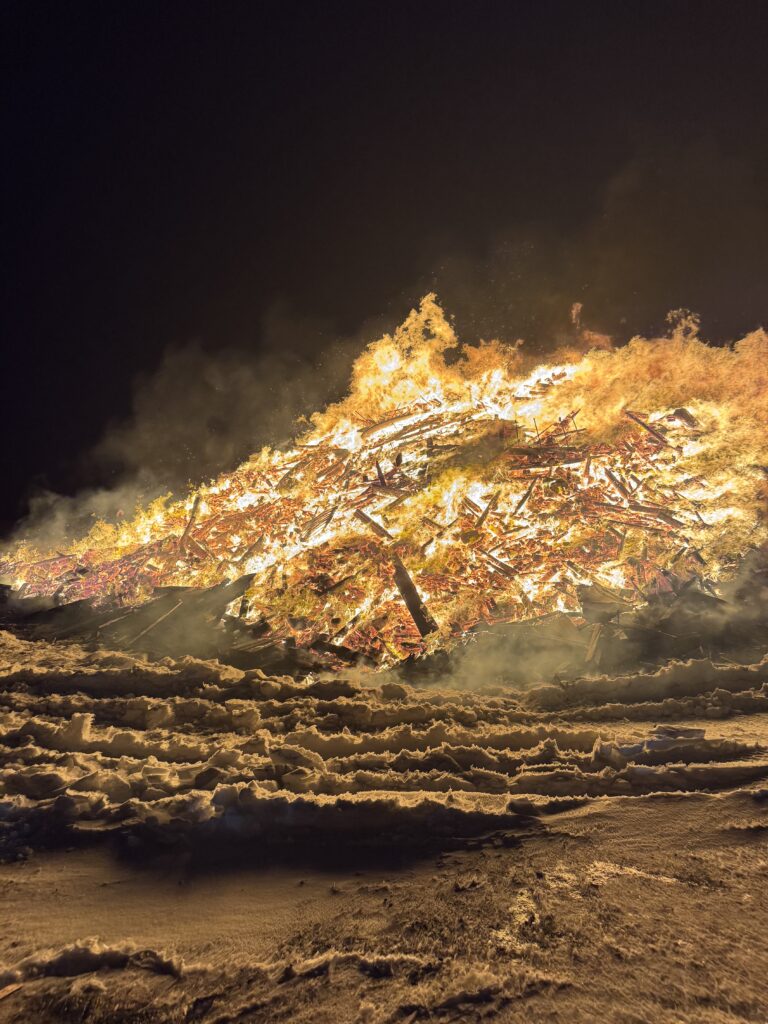 large bonfire burning like crazy