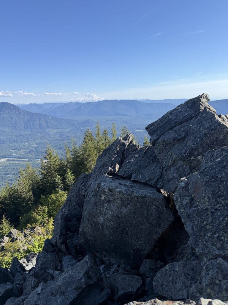 rocks with Mt Rainier in the distance.