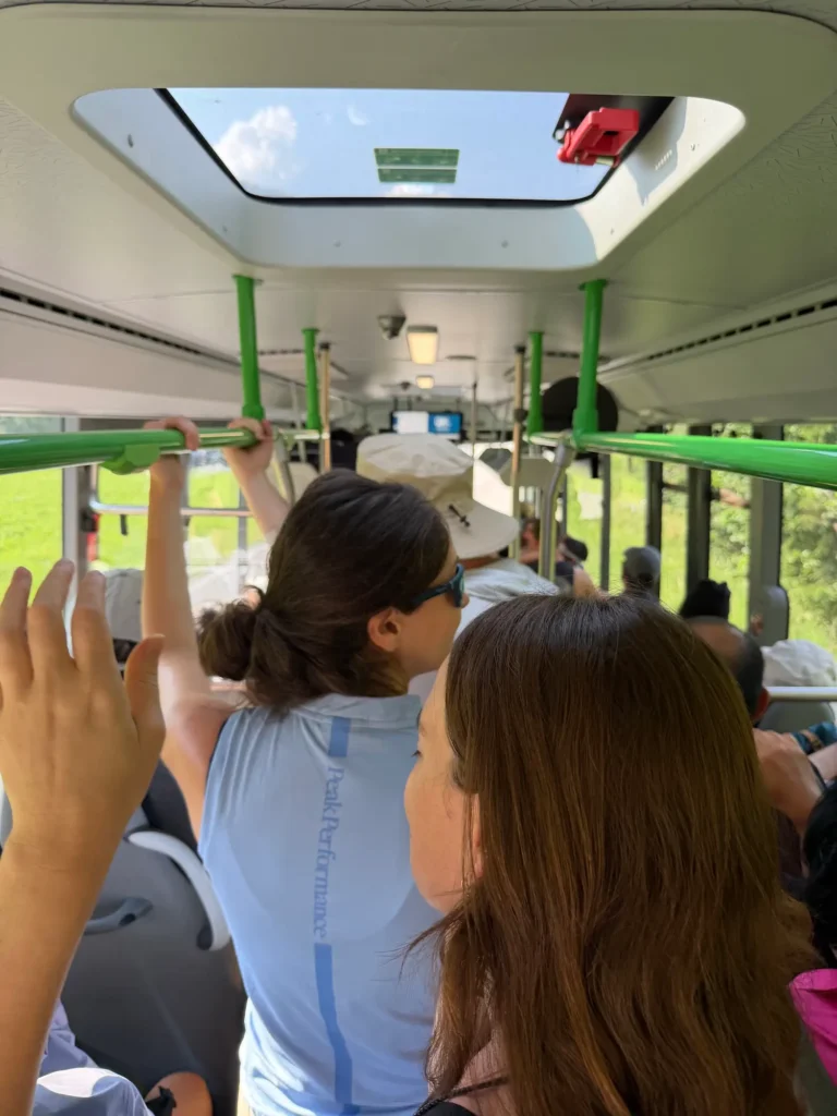 people standing on a crowded bus