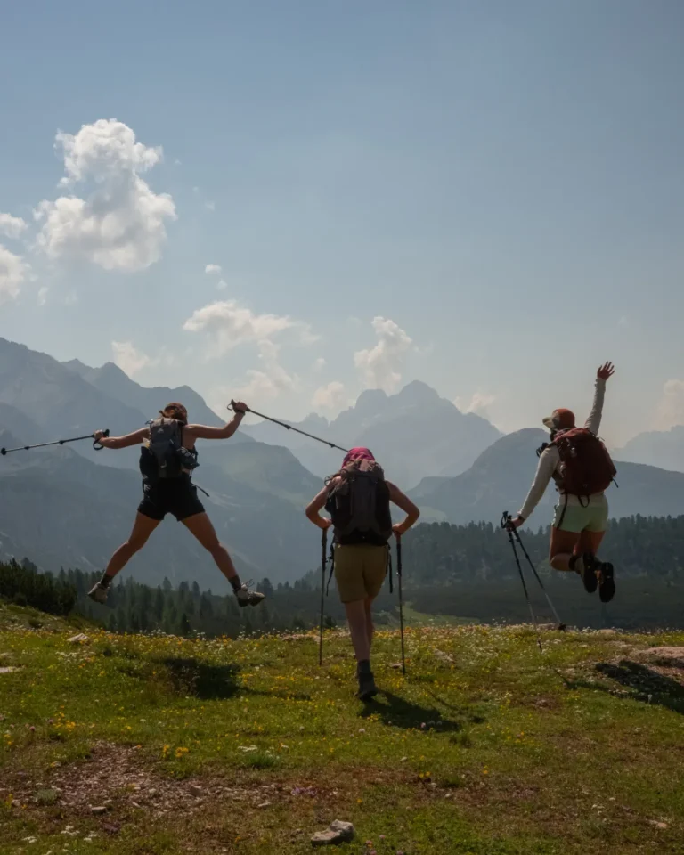 three girls jumping for joy on the Alta Via 1