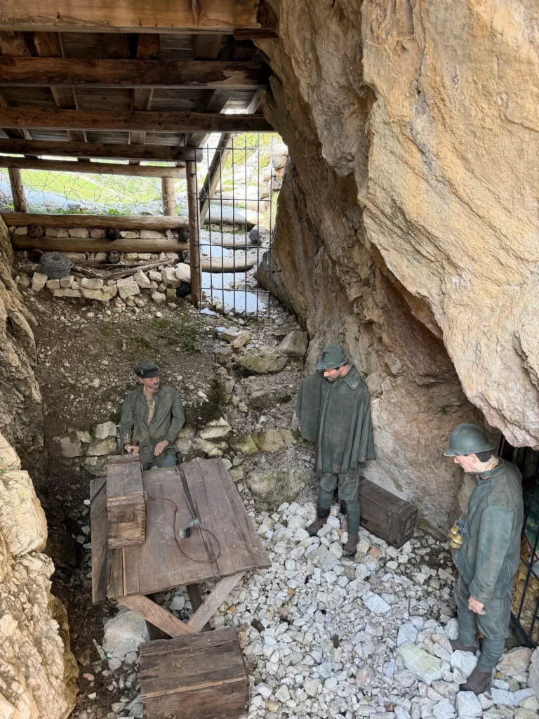 Soldiers (fake) standing over table in Cinque Torri open air musuem