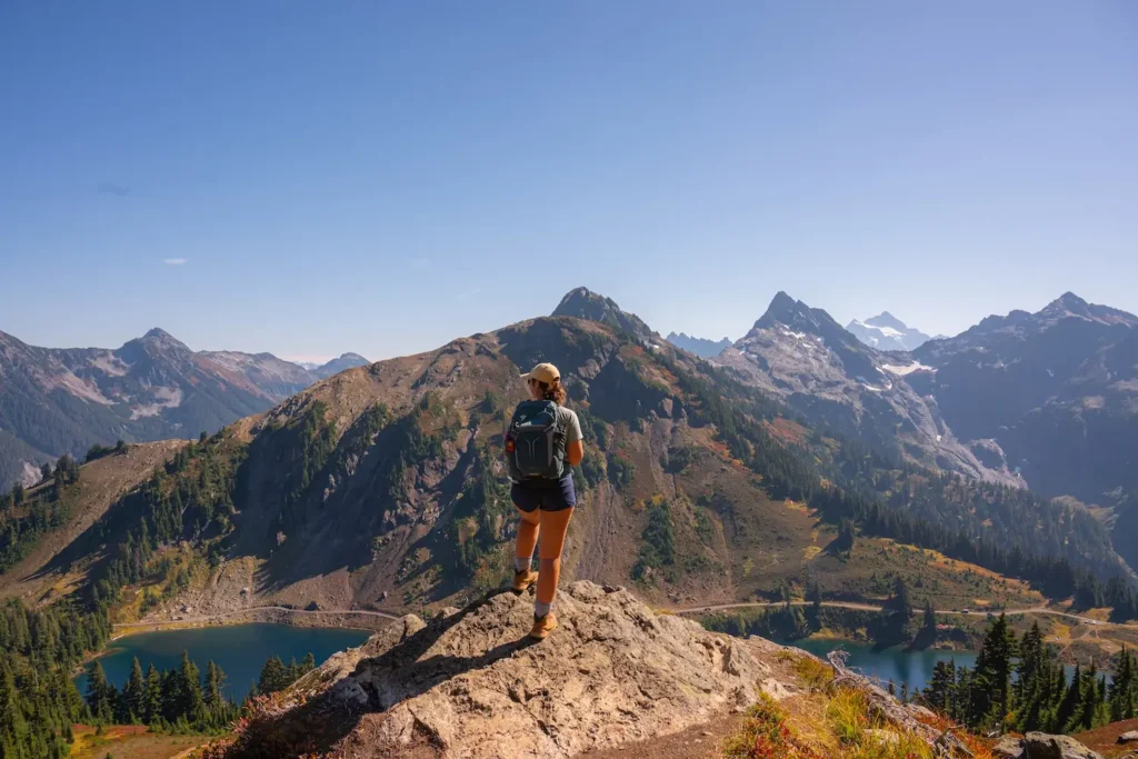 girl standing on top of winchester Mountain Looking out 